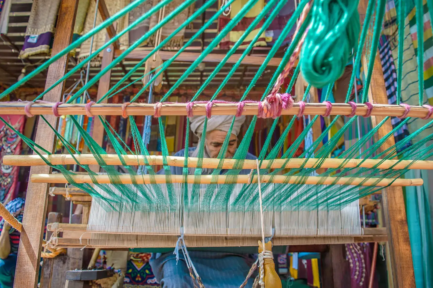 An Egyptian hand loom strung with its warp threads, in a workshop, in a photograph from 2017.