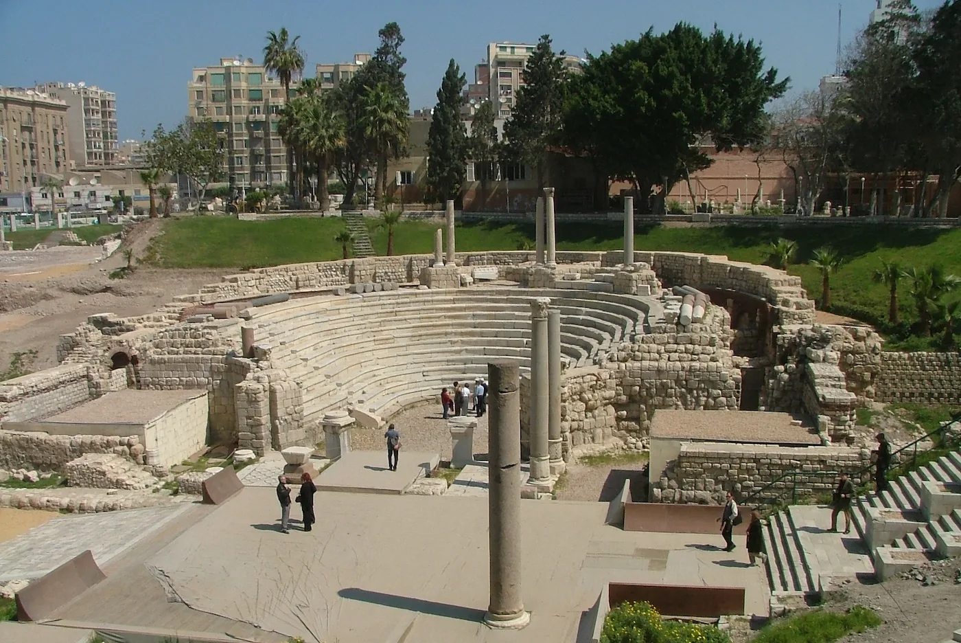 The tiered seats of the Roman theatre at Kom el-Dikka, with modern Alexandria behind.