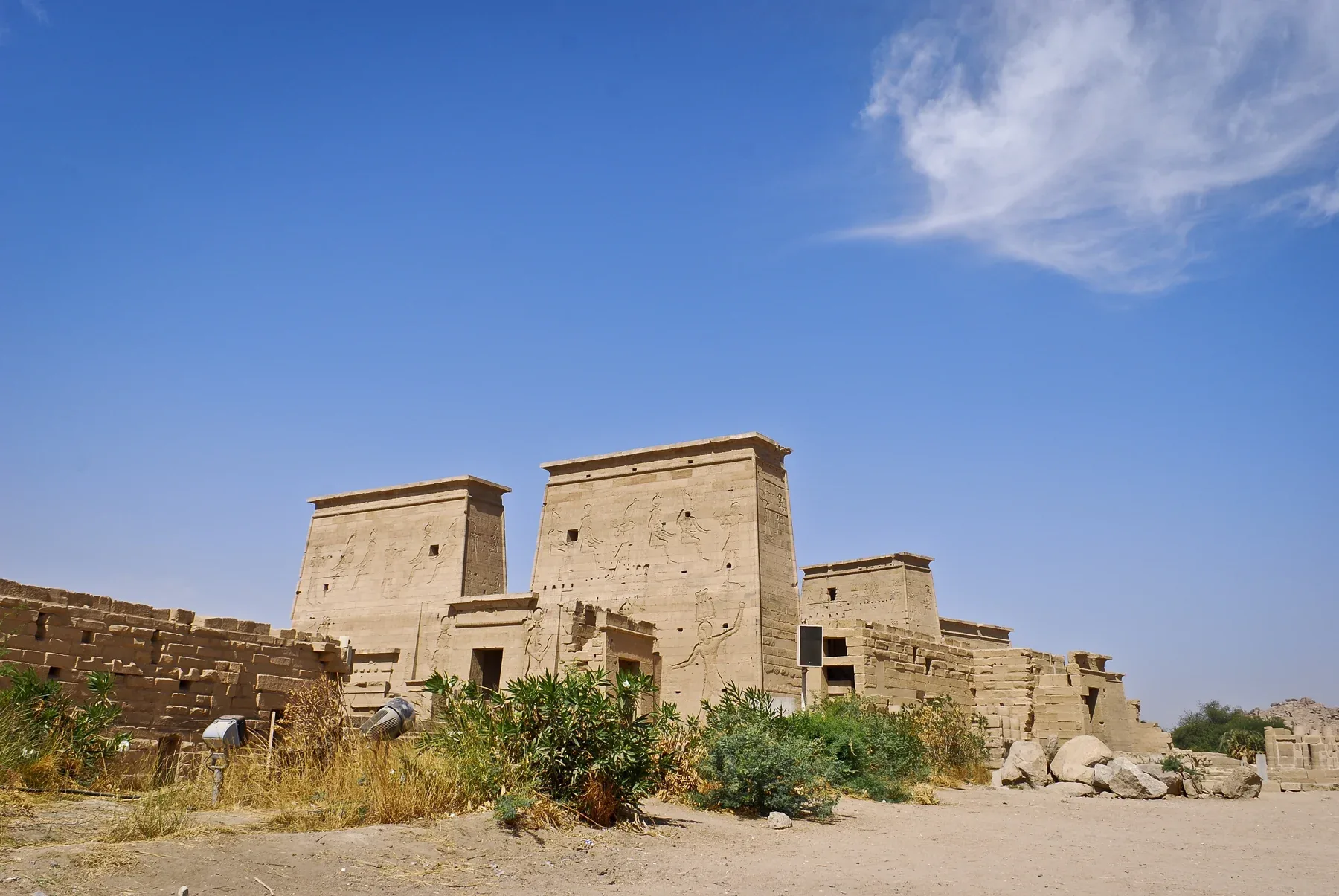 The temple buildings at Philae under a blue sky.